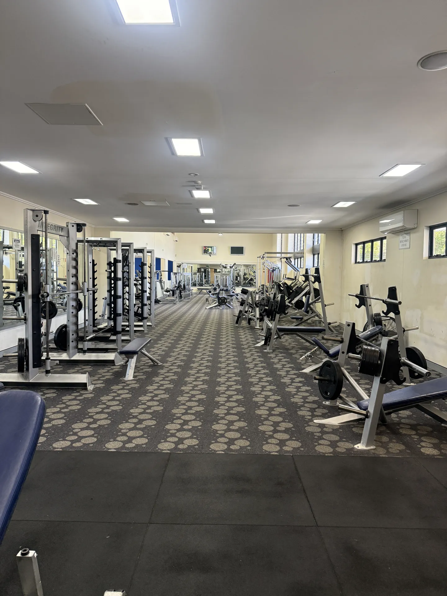 Strength machines and racks on the gym floor at Metaform Fitness Springfield